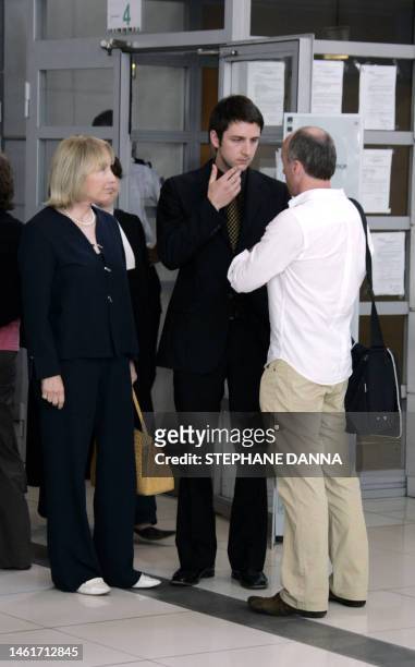 Nicholas Edmund Anthony Ashley-Cooper , 12th Earl of Shaftesbury, chats with a journalist as he stands next to his mother in the courthouse of Nice,...