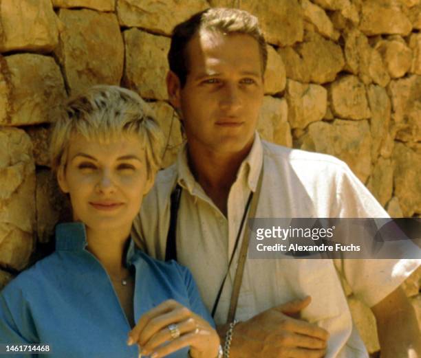 Actress Joanne Woodward and actor Paul Newman pose for a portrait of the couple while visiting Masada in Israel in 1959.