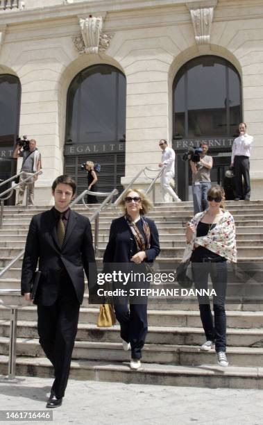 Nicholas Edmund Anthony Ashley-Cooper , 12th Earl of Shaftesbury, gets down the stairs of the courthouse of Nice, southern France with his mother ,...