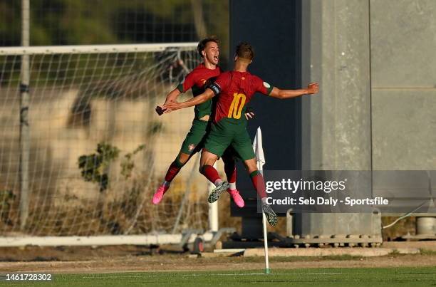 Hugo Félix of Portugal, left, celebrates with teammate Diogo Prioste after scoring their side's second goal uring the UEFA European Under-19...