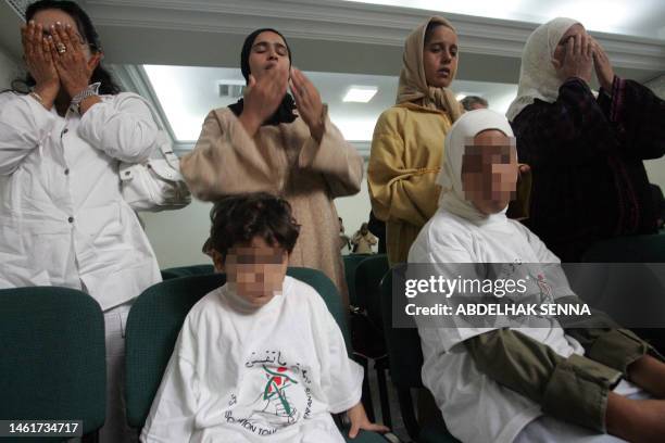 Asma and Khaoula victims of a pedophile, attend with their mothers a meeting gathering several groups including Moroccan association "Ne touche pas a...