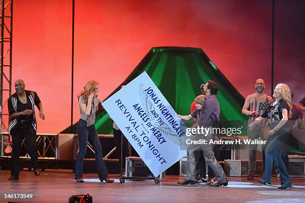 Richard Fleeshman and Caissie Levy perform from 'Ghost the Musical' perform onstage at the 66th Annual Tony Awards at The Beacon Theatre on June 10,...