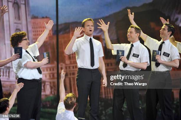 Host Neil Patrick Harris performs with the cast of 'Book of Mormon' onstage at the 66th Annual Tony Awards at The Beacon Theatre on June 10, 2012 in...