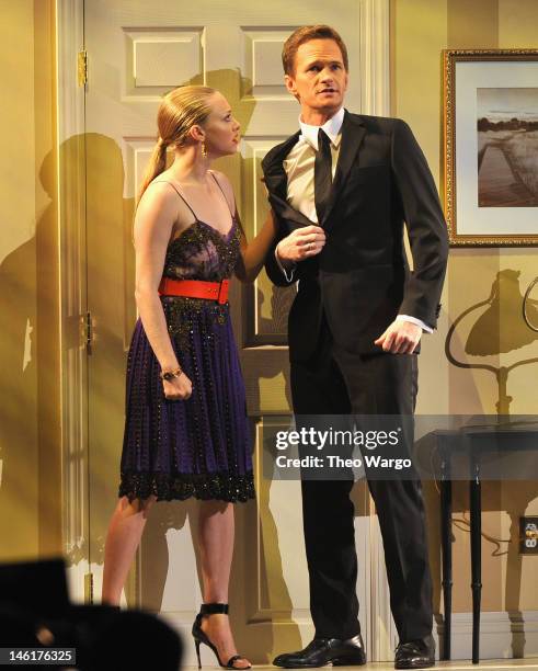 Neil Patrick Harris and Amanda Seyfried perform onstage at the 66th Annual Tony Awards at The Beacon Theatre on June 10, 2012 in New York City.