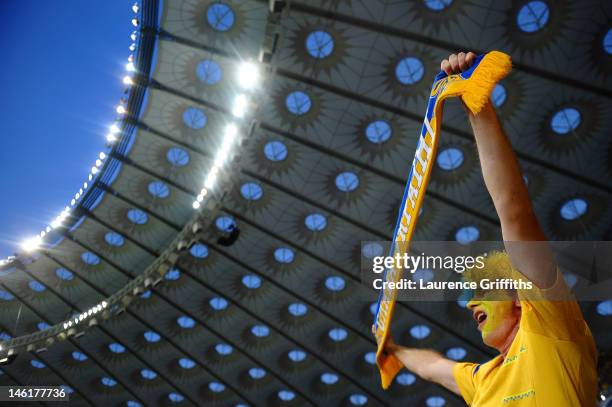 Football fan soaks up the atmosphere ahead of the UEFA EURO 2012 group D match between Ukraine and Sweden at The Olympic Stadium on June 11, 2012 in...