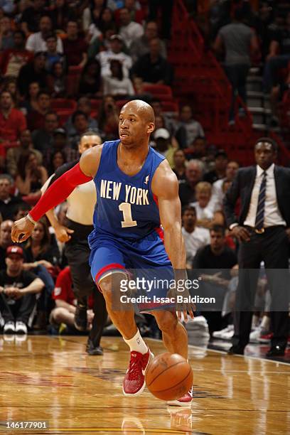 Sundiata Gaines of the New Jersey Nets handles the ball against the Miami Heat on March 6, 2012 at American Airlines Arena in Miami, Florida. NOTE TO...