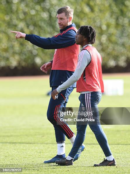 Arsenal Academy Director Per Mertesacker with Tino Quamina during the