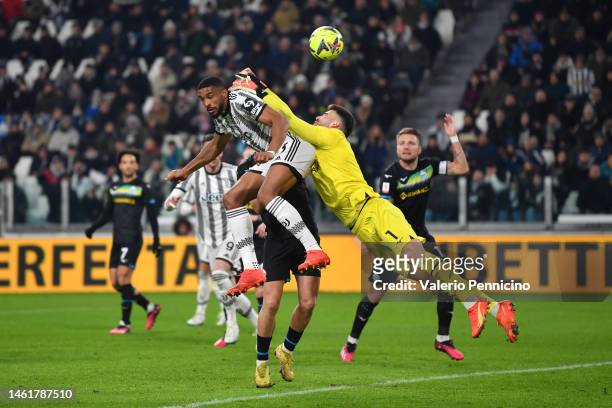 Bremer of Juventus scores the team's first goal under pressure from Luis Maximiano of SS Lazio during the Coppa Italia Quarter Final match between...