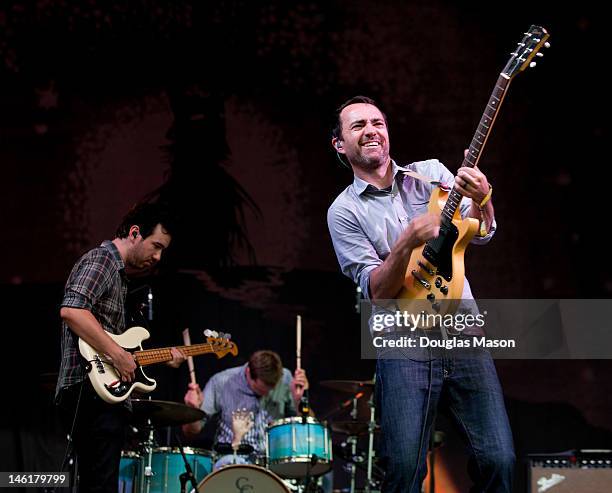 Yuuki Matthews, Joe Plummer, and James Mercer of The Shins perform during the 2012 Bonnaroo Music and Arts Festival on June 10, 2012 in Manchester,...