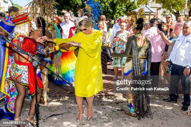 Queen Maxima of the Netherlands dances with Carnival performers in the Scharloo neighborhood as the Dutch Royal Family Tour the Dutch Caribbean...