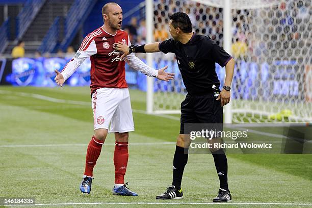 Kris Boyd of the Portland Timbers argues a call with a official during the MLS match against the Montreal Impact at the Olympic Stadium on April 28,...