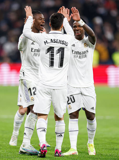 Marco Asensio player of Real Madrid celebrates his goal with teammates Eduardo Camavinga and Vinicius Jr. During the LaLiga Santander match between...