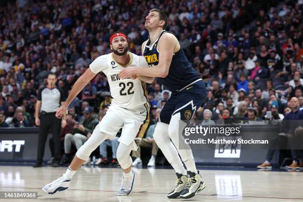 Larry Nance Jr. #22 of the New Orleans Pelicans lines up against Nikola Jokic of the Denver Nuggets in the fourth quarter at Ball Arena on January...