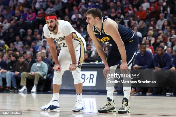 Larry Nance Jr. #22 of the New Orleans Pelicans lines up against Nikola Jokic of the Denver Nuggets in the fourth quarter at Ball Arena on January...