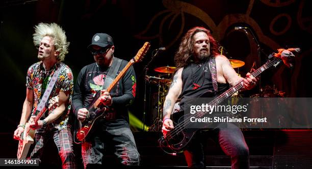 Ben Wells, Chris Robertson and Steve Jewell of Black Stone Cherry perform at Manchester Arena on February 02, 2023 in Manchester, England.