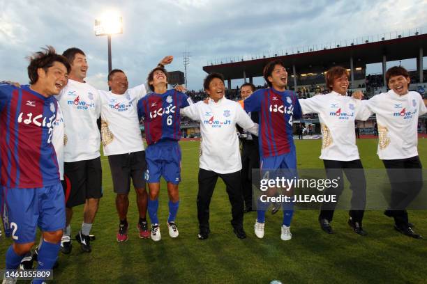 Ventforet Kofu players celebrate the team's 2-2 draw confirming the promotion to the J1 after the J.League J2 match between Ventforet Kofu and Shonan...