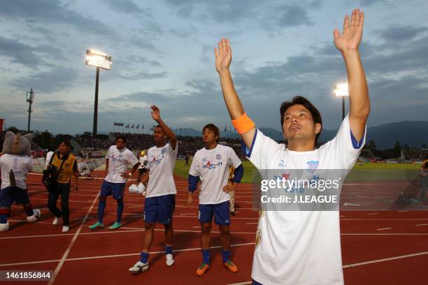 Captain Hideomi Yamamoto of Ventforet Kofu applauds fans after the team's 2-2 draw confirming the promotion to the J1 following the J.League J2 match...