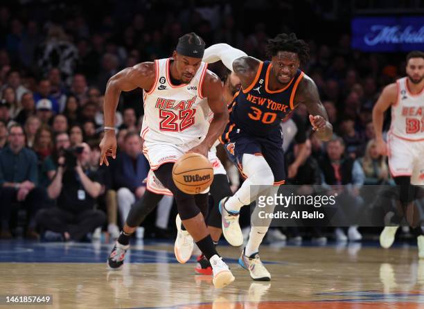 Jimmy Butler of the Miami Heat steals the ball away from Julius Randle of the New York Knicks during their game at Madison Square Garden on February...