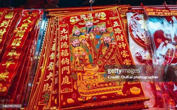 god of wealth in china - chinese new year decorations - couplets ストックフォトと画像