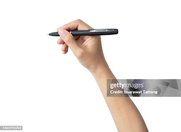 young woman holding pen on white background, closeup - human arm photos et images de collection