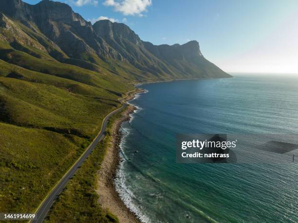 scenic coastal road along a beautiful coastline - south africa aerial stock pictures, royalty-free photos & images