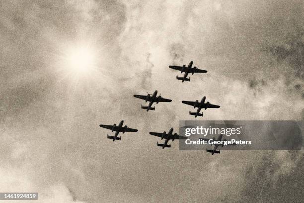 ww2 mitchell b-25 medium bombers flying in v-formation - explosive imagens e fotografias de stock