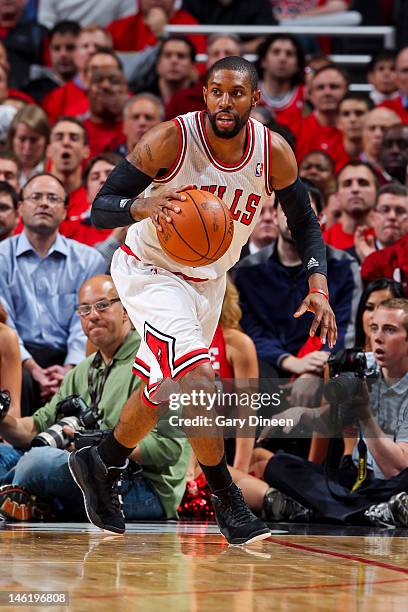 Watson of the Chicago Bulls controls the ball against the Philadelphia 76ers in Game Two of the Eastern Conference Quarterfinals during the 2012 NBA...