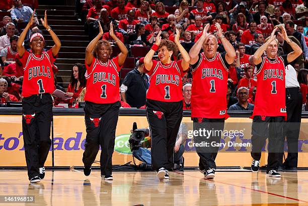 The Chicago Bulls Swingin' Seniors perform in Game Two of the Eastern Conference Quarterfinals against the Philadelphia 76ers during the 2012 NBA...