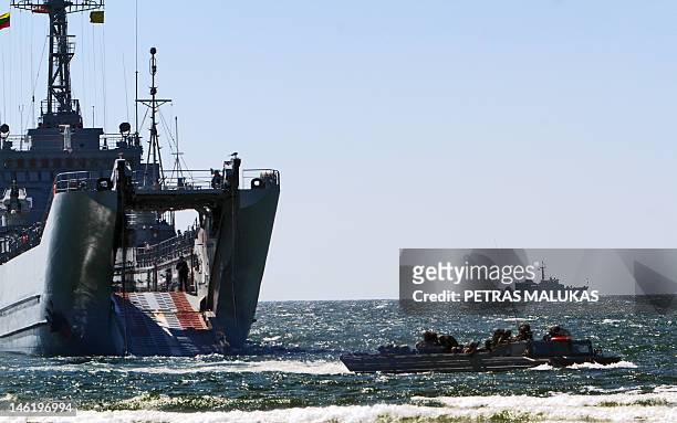 Army troops conduct a landing operation during the multinational exercise “ BALTOPS 2012” on June 11, 2012 in Nemirseta . BALTOPS 2012 involved seven...