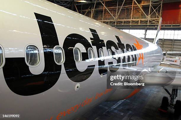 Jetstar Japan Co.'s Airbus SAS A320 aircraft sits in a hangar during a media preview at Narita Airport in Narita City, Chiba Prefecture, Japan, on...