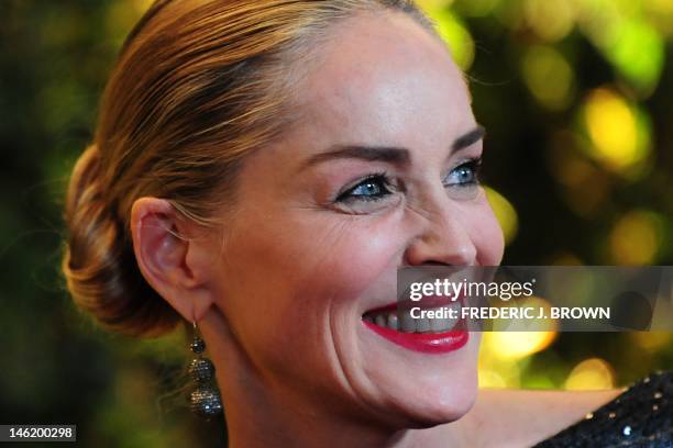 Oscar-nominated actress Sharon Stone poses on arrival at the 3rd Annual Governors Awards in Hollywood on November 12, 2011 in southern California....