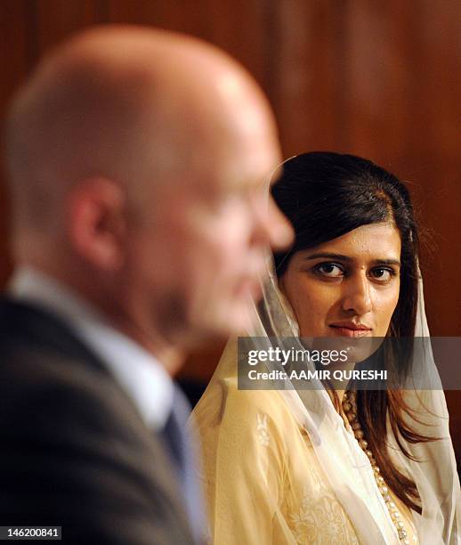 H Rabani Pakistan's Foreign Minister Hina Rabbani Khar looks on during a joint ...