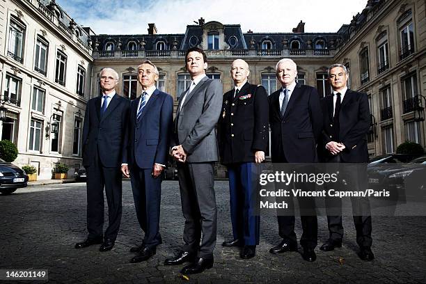 Minister of Interior for France Manuel Valls is photographed with his aides Bernard Boucault, Claude Baland, General Jacques Mignaux, Jean Daubigny,...