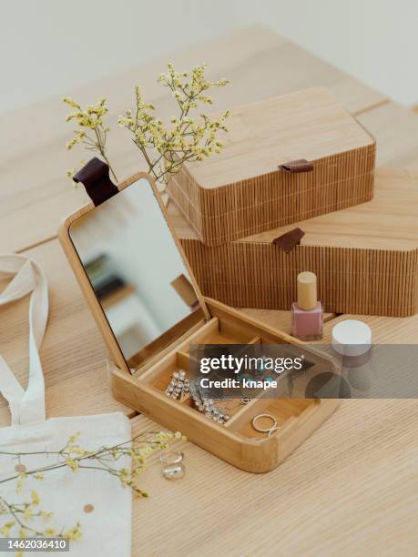 modern organizers in wood with jewelry at home jewelry box and flowers - juwelendoos stockfoto's en -beelden