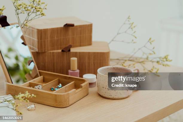 modern still life at home jewelry box in wood make up and coffe cup - make up table stock pictures, royalty-free photos & images