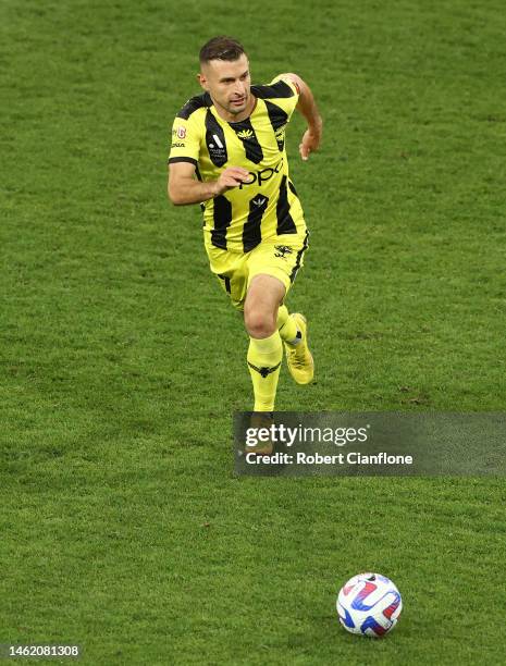 Kosta Barbarouses of the Phoenix runs with the ball during the round 15 A-League Men's match between Melbourne Victory and Wellington Phoenix at AAMI...