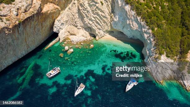 beautiful beaches and coast of ionian island - catamaran stock pictures, royalty-free photos & images