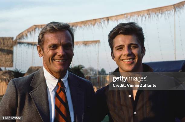 Tab Hunter and Maxwell Caulfield on the set of 'Grease 2' in Norwalk, California, December 1981.