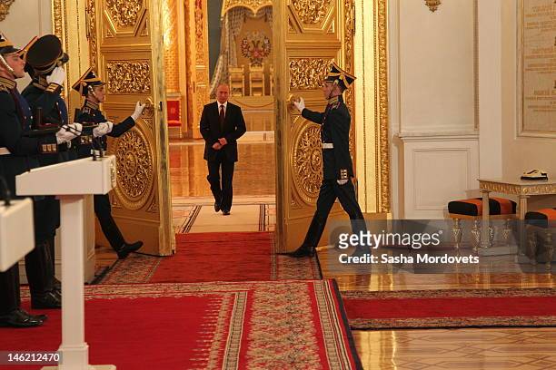 Russian President Vladimir Putin attends an awarding ceremony on the National Day of Russia at the Grand Kremlin Palace on June 12, 2011 in Moscow,...