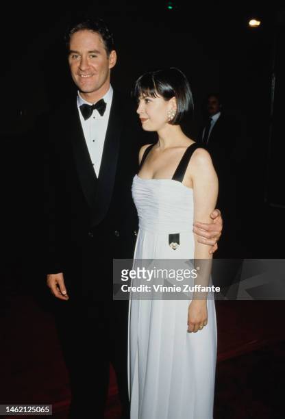 Kevin Kline and Phoebe Cates attend 63rd Annual Academy Awards at Shrine Auditorium in Los Angeles, California, United States, 25th March 1991.