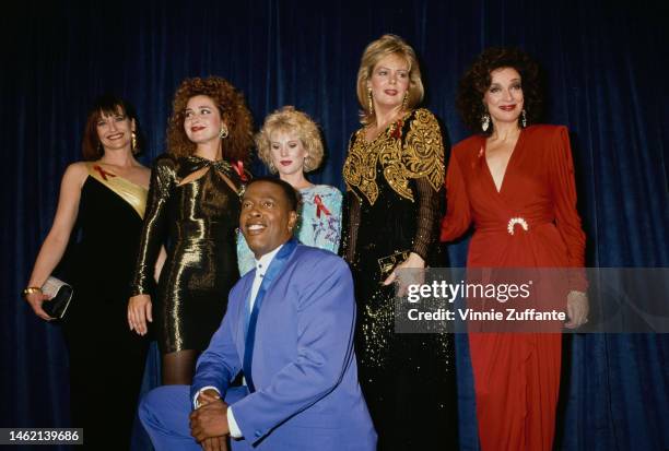 The cast of CBS sitcom 'Designing Women' Jan Hooks, Annie Potts, Julia Duffy, Meshach Taylor, Jean Smart, and Dixie Carter in the press room of the...