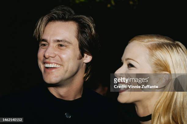 Jim Carrey and Lauren Holly during the 1995 MTV Movie Awards at Warner Bros. Studios in Burbank, California, United States, 10th June 1995.