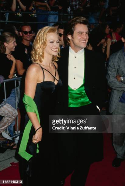 Lauren Holly and Jim Carrey during "Batman Forever" Los Angeles Premiere at Mann's Village Theater in Westwood, California, United States, 9th June...