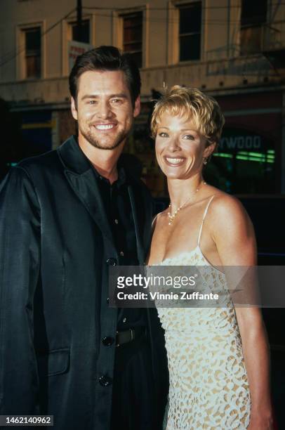 Jim Carrey and actress Lauren Holly attend "The Cable Guy" Hollywood Premiere at the Mann's Chinese Theatre in Hollywood, California, United States,...