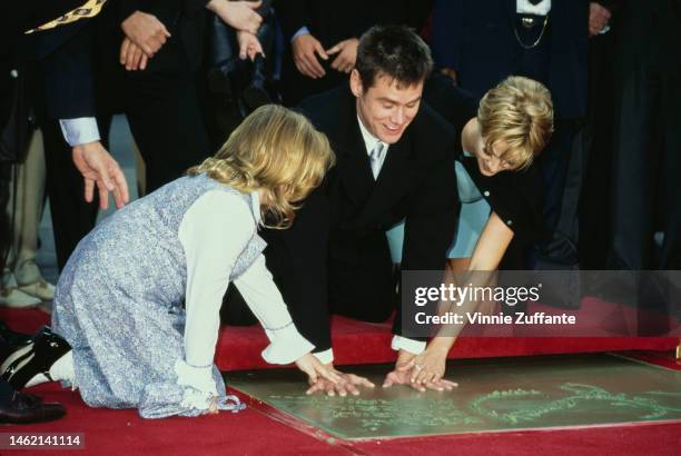 Jim Carrey and his family during Jim Carrey Footprint Ceremony at Mann's Chinese Theatre in Hollywood, California, United States, 2nd November 1995.