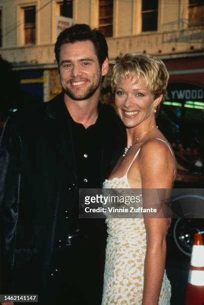 Jim Carrey and actress Lauren Holly attend "The Cable Guy" Hollywood Premiere at the Mann's Chinese Theatre in Hollywood, California, United States,...