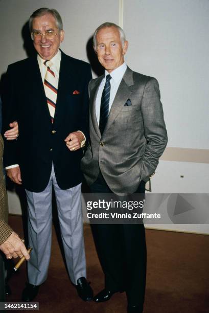 Johnny Carson and Ed McMahon together at a social gathering, circa 1980s.