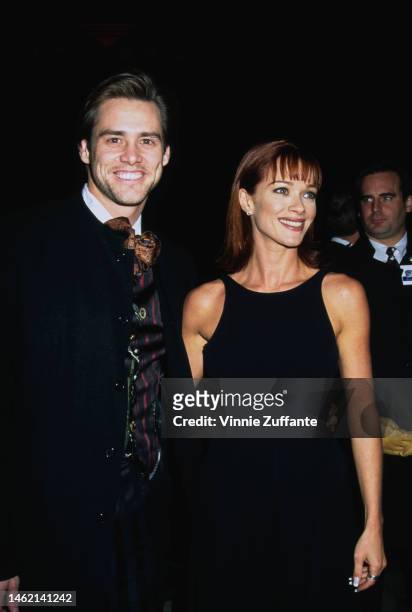 Jim Carrey & Lauren Holly during "Dumb and Dumber" Hollywood Premiere at Cinerama Dome Theater in Hollywood, California, United States, 6th December...