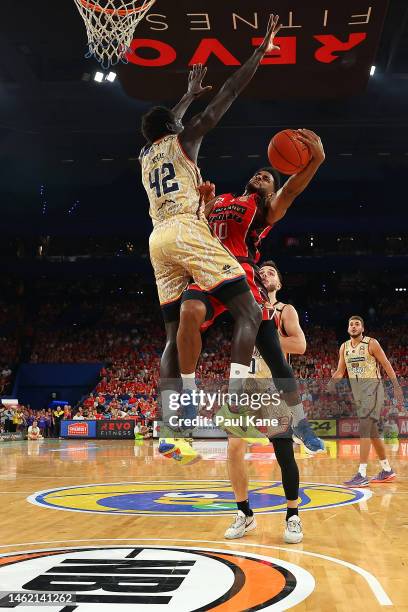 Corey Webster of the Wildcats goes to the basket against Bul Kuol of the Taipans during the round 18 NBL match between Perth Wildcats and Cairns...