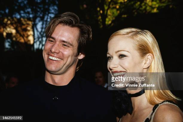 Jim Carrey and Lauren Holly during 1995 MTV Movie Awards in Los Angeles, California, United States, 7th September 1995.